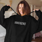 Vaneigens | Unisex oversize Hoodie uit Oost-Vlaanderen op vrouwelijk model